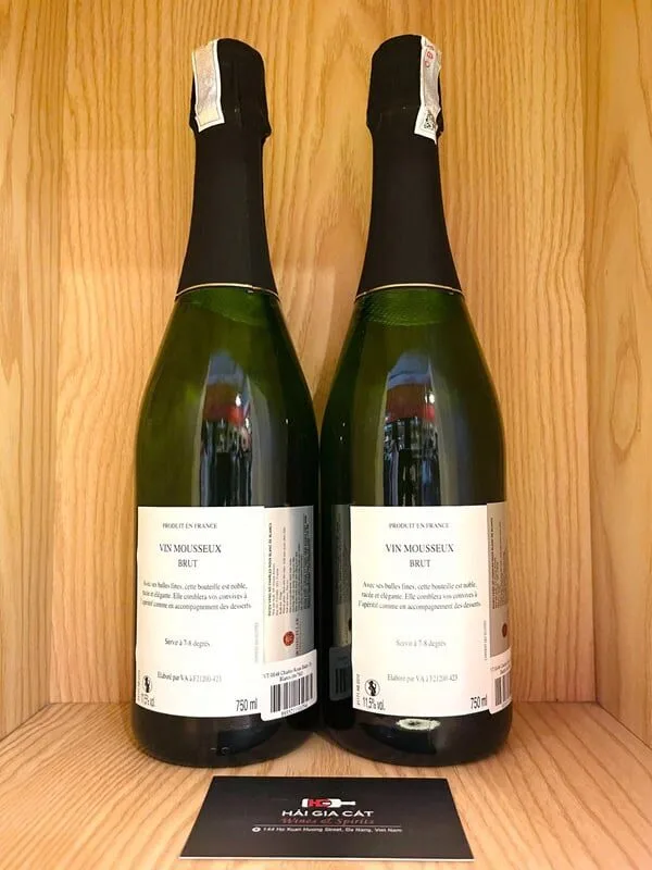 Mặt sau chai rượu vang nổ Charles Roux Blanc de Blancs Brut